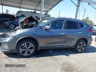 2017 Nissan Rogue S with VIN JN8AT2MV9HW263307, listed as a IAAI auction lot 42317181 with 114,445 mi miles and . Bid and sale history available at DreamBid. Image 14.