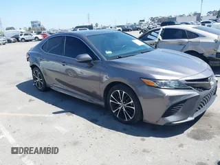 2019 Toyota Camry LE z VIN 4T1B11HK5KU166295, wystawiony jako IAAI lot #42087581 z przebiegiem 87 876 mil mil oraz . Historia ofert i sprzedaży dostępna na DreamBid. Obrazek 1.