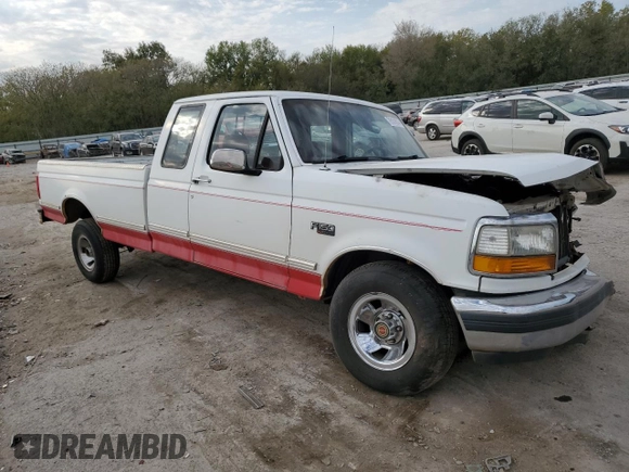 1992 Ford F-150 with VIN 1FTEX15N5NKA30134, listed as a Copart auction lot 76131814 with 213,258 mi miles and Salvage Title. Bid and sale history available at carsss.com. Image 4.