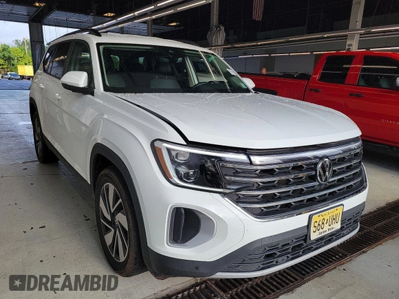 2024 Volkswagen Atlas SE with VIN 1V2HR2CA2RC556331, listed as a IAAI auction lot 42806429 with 25,239 mi miles and . Bid and sale history available at DreamBid. Image 7.