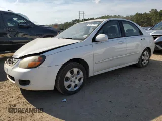 2009 Kia Spectra LX with VIN KNAFE221295606992, listed as a Copart auction lot 72767494 with 163,041 mi miles and Salvage Title. Bid and sale history available at carsss.com. Image 1.