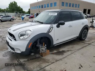 2015 MINI Countryman S with VIN WMWZC5C58FWP46931, listed as a Copart auction lot 59183495 with 105,731 mi miles and Salvage title. Bid and sale history available at DreamBid. Image 1.
