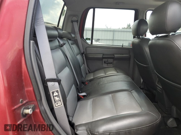 2004 Ford Explorer Sport Trac XLS z VIN 1FMZU77K84UB23731, wystawiony jako Copart lot #65250575 z przebiegiem 236 109 mil mil oraz Szkoda całkowita • Salvage title. Historia ofert i sprzedaży dostępna na DreamBid. Obrazek 10.