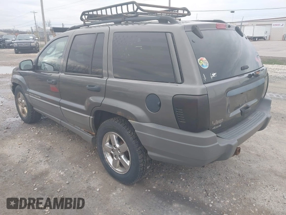 2002 Jeep Grand Cherokee Laredo with VIN 1J4GW48S92C294116, listed as a IAAI auction lot 42080375 with 154,108 mi miles and . Bid and sale history available at DreamBid. Image 3.
