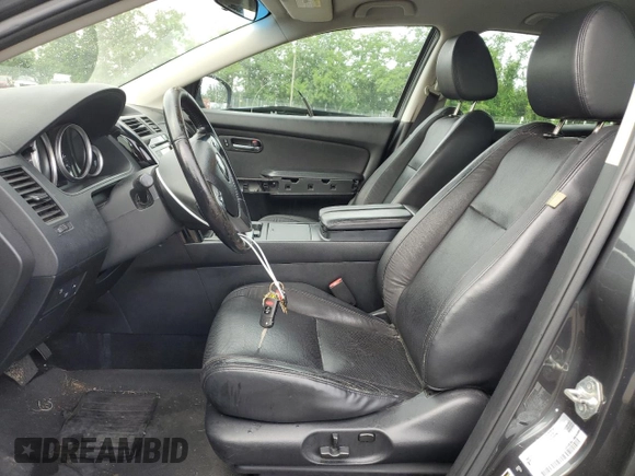 2015 Mazda CX-9 Touring z VIN JM3TB2CA2F0452202, wystawiony jako Copart lot #60407215 z przebiegiem 158 373 mil mil oraz Szkoda całkowita • Salvage title. Historia ofert i sprzedaży dostępna na DreamBid. Obrazek 7.