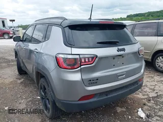 2018 Jeep Compass Latitude with VIN 3C4NJDBB8JT323967, listed as a IAAI auction lot 42096644 with 143,761 mi miles and . Bid and sale history available at DreamBid. Image 3.