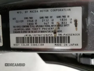 2010 Mazda 3 i Sport with VIN JM1BL1SF9A1128255, listed as a Copart auction lot 82906834 with 161,143 mi miles and Salvage Title. Bid and sale history available at DreamBid. Image 13.