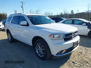 2018 Dodge Durango SXT with VIN 1C4RDJAG2JC329778, listed as a IAAI auction lot 41692424 with 180,105 mi miles and . Bid and sale history available at DreamBid. Image 1.