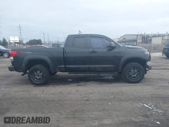 2009 Toyota Tundra 4WD Truck with VIN 5TFBW54119X091419, listed as a IAAI auction lot 41031994 with 214,922 mi miles. Bid and sale history available at carsss.com. Image 13.