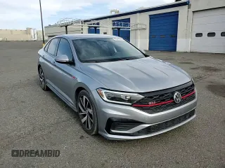 2019 Volkswagen Jetta GLI S z VIN 3VW6T7BU1KM244828, wystawiony jako Copart lot #56495205 z przebiegiem 112 512 mil mil oraz Szkoda całkowita • Salvage title. Historia ofert i sprzedaży dostępna na DreamBid. Obrazek 13.