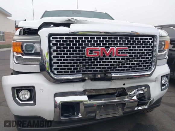 2015 GMC Sierra 2500HD Denali with VIN 1GT120E85FF681680, listed as a IAAI auction lot 42081711 with 67,676 mi miles and . Bid and sale history available at DreamBid. Image 6.