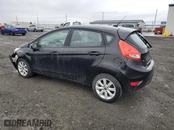2013 Ford Fiesta SE with VIN 3FADP4EJ5DM119614, listed as a Copart auction lot 48731575 with 64,676 mi miles and Salvage Title. Bid and sale history available at carsss.com. Image 2.