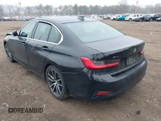 2021 BMW 3 Series 330i xDrive with VIN 3MW5R7J0XM8B71673, listed as a IAAI auction lot 41829475 with 90,276 mi miles. Bid and sale history available at carsss.com. Image 3.