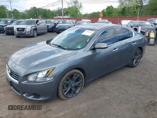 2014 Nissan Maxima S with VIN 1N4AA5AP9EC432415, listed as a IAAI auction lot 42230164 with 149,080 mi miles and . Bid and sale history available at DreamBid. Image 6.
