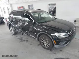 2019 Volkswagen Tiguan S with VIN 3VV1B7AX1KM073074, listed as a IAAI auction lot 41387775 with 57,045 mi miles. Bid and sale history available at carsss.com. Image 1.