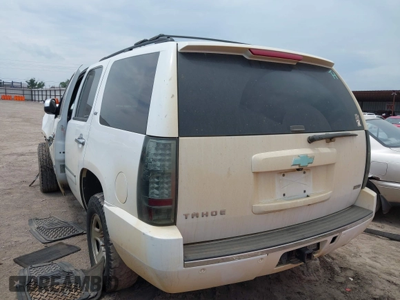 2012 Chevrolet Tahoe LTZ with VIN 1GNSCCE00CR197950, listed as a IAAI auction lot 42393693 with 296,161 mi miles and . Bid and sale history available at DreamBid. Image 3.