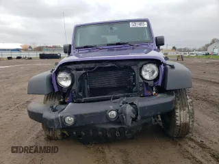 2017 Jeep Wrangler Willys Wheeler with VIN 1C4AJWAG0HL641188, listed as a Copart auction lot 52814005 with 94,959 mi miles and Salvage Title. Bid and sale history available at DreamBid. Image 5.
