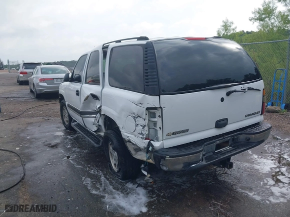 2005 Chevrolet Tahoe Z71 with VIN 1GNEC13T85R203611, listed as a IAAI auction lot 39482026 with 264,918 mi miles. Bid and sale history available at carsss.com. Image 3.