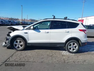 2016 Ford Escape SE with VIN 1FMCU9GX2GUB29249, listed as a IAAI auction lot 41545211 with 97,631 mi miles. Bid and sale history available at carsss.com. Image 15.