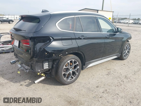 2021 BMW X1 xDrive28i with VIN WBXJG9C05M5T83784, listed as a IAAI auction lot 41696073 with 15,865 mi miles and . Bid and sale history available at DreamBid. Image 4.