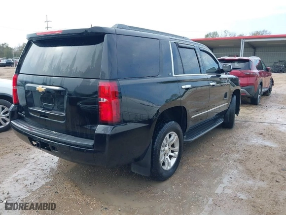 2017 Chevrolet Tahoe LT with VIN 1GNSKBKC3HR135025, listed as a IAAI auction lot 41176528 with 168,195 mi miles. Bid and sale history available at carsss.com. Image 4.