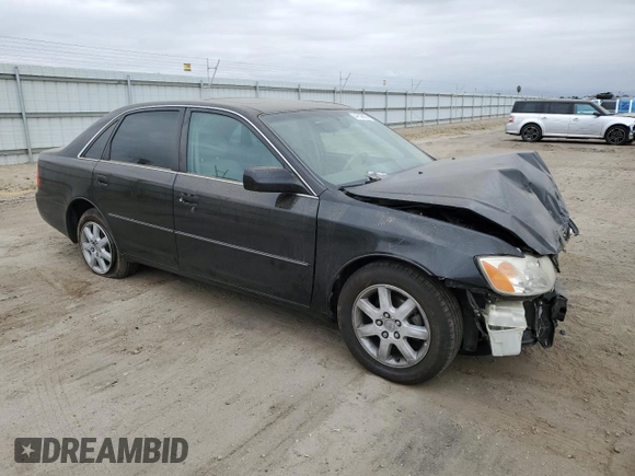 2000 Toyota Avalon XL with VIN 4T1BF28B4YU105732, listed as a Copart auction lot 54752665 with 143,855 mi miles and Salvage Title. Bid and sale history available at DreamBid. Image 4.