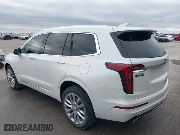 2021 Cadillac XT6 Premium Luxury z VIN 1GYKPCRS8MZ233209, wystawiony jako IAAI lot #40012714 z przebiegiem 45 599 mil mil oraz . Historia ofert i sprzedaży dostępna na DreamBid. Obrazek 3.