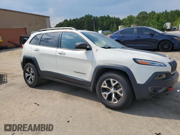 2018 Jeep Cherokee Trailhawk with VIN 1C4PJMBX0JD610455, listed as a Copart auction lot 61251565 with 75,818 mi miles and Salvage title. Bid and sale history available at DreamBid. Image 4.