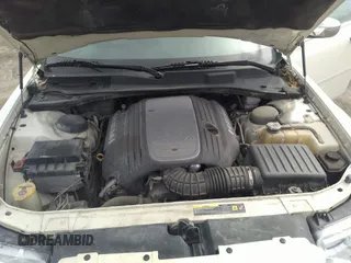 2005 Chrysler 300 with VIN 2C3JA63H65H144648, listed as a IAAI auction lot 41762730 with 125,757 mi miles. Bid and sale history available at carsss.com. Image 10.