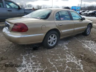 1999 Lincoln Continental with VIN 1LNHM97V2XY644250, listed as a Copart auction lot 82440454 with 196,568 mi miles and Clean Title. Bid and sale history available at carsss.com. Image 3.