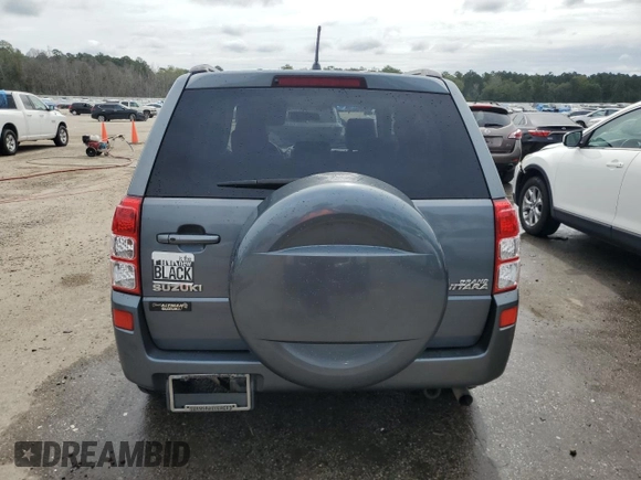 2006 Suzuki Grand Vitara Luxury z VIN JS3TE947164101951, wystawiony jako Copart lot #70110914 z przebiegiem 304 718 mil mil oraz Szkoda całkowita • Salvage title. Historia ofert i sprzedaży dostępna na DreamBid. Obrazek 6.