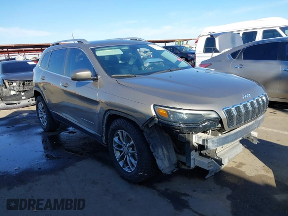 2020 Jeep Cherokee Latitude Plus with VIN 1C4PJLLB5LD521965, listed as a IAAI auction lot 41232028 with 77,729 mi miles. Bid and sale history available at carsss.com. Image 1.