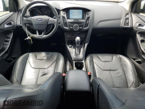 2017 Ford Focus Titanium with VIN 1FADP3N24HL206365, listed as a Copart auction lot 63199965 with 51,435 mi miles and Salvage title. Bid and sale history available at DreamBid. Image 8.