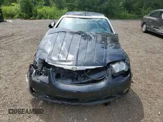 2004 Chrysler Crossfire z VIN 1C3AN69L54X014337, wystawiony jako Copart lot #64790664 z przebiegiem 121 344 mil mil oraz Czysty tytuł • Clean title. Historia ofert i sprzedaży dostępna na DreamBid. Obrazek 5.
