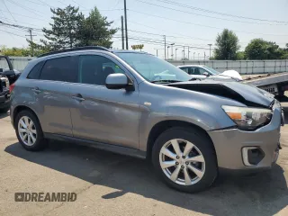 2015 Mitsubishi Outlander SE with VIN 4A4AR4AU2FE011699, listed as a Copart auction lot 60509945 with 141,192 mi miles and Salvage title. Bid and sale history available at DreamBid. Image 4.