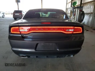 2013 Dodge Charger SE z VIN 2C3CDXBG4DH735185, wystawiony jako Copart lot #56763685 z przebiegiem 119 640 mil mil oraz Szkody całkowita. Historia ofert i sprzedaży dostępna na DreamBid. Obrazek 6.