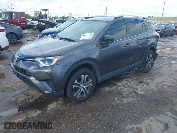 2016 Toyota RAV4 LE with VIN JTMZFREV5GJ097330, listed as a IAAI auction lot 41884397 with 107,699 mi miles. Bid and sale history available at carsss.com. Image 2.