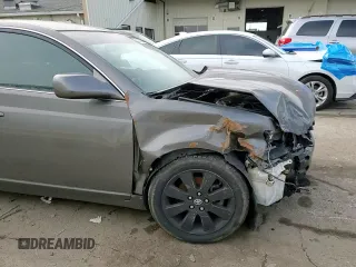 2007 Toyota Avalon XL z VIN 4T1BK36B47U203243, wystawiony jako Copart lot #43217085 z przebiegiem 250 749 mil mil oraz Nie do naprawy • Non repairable. Historia ofert i sprzedaży dostępna na DreamBid. Obrazek 11.