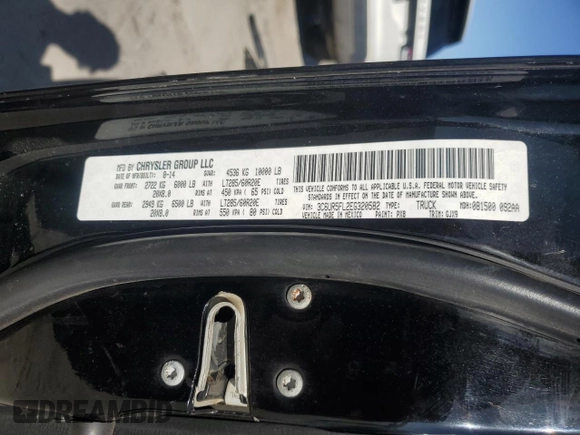 2014 Ram 2500 Laramie with VIN 3C6UR5FL2EG320582, listed as a Copart auction lot 52282625 with 216,745 mi miles and Salvage title. Bid and sale history available at DreamBid. Image 13.