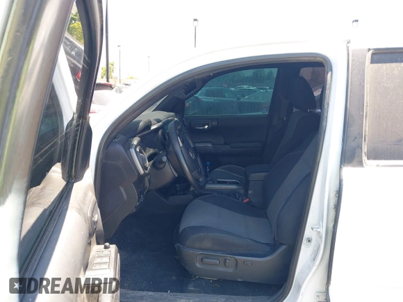 2023 Toyota Tacoma SR with VIN 3TMCZ5AN4PM558760, listed as a IAAI auction lot 42626514 with 39,335 mi miles and . Bid and sale history available at DreamBid. Image 5.