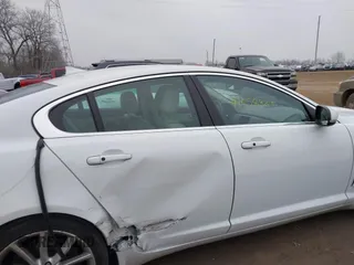 2015 Jaguar XF V6 Portfolio with VIN SAJWJ0FF2F8U59934, listed as a IAAI auction lot 41558305 with 120,219 mi miles. Bid and sale history available at carsss.com. Image 13.