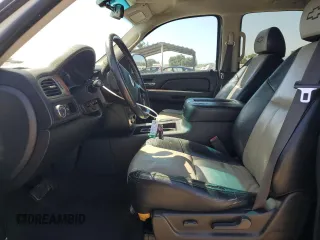 2007 Chevrolet Tahoe LTZ with VIN 1GNFC13J47R182259, listed as a Copart auction lot 57441205 with 204,898 mi miles and Salvage title. Bid and sale history available at DreamBid. Image 7.