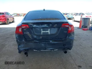 2013 Volvo S60 T5 Premier z VIN YV1612FS4D2217471, wystawiony jako IAAI lot #41986419 z przebiegiem 96 910 mil mil oraz . Historia ofert i sprzedaży dostępna na DreamBid. Obrazek 16.