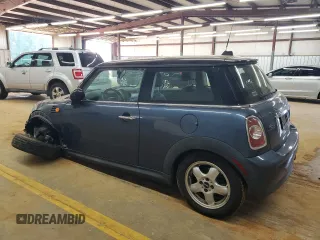2011 MINI Hardtop with VIN WMWSU3C54BT184251, listed as a Copart auction lot 59298135 with 123,864 mi miles and Salvage title. Bid and sale history available at DreamBid. Image 2.