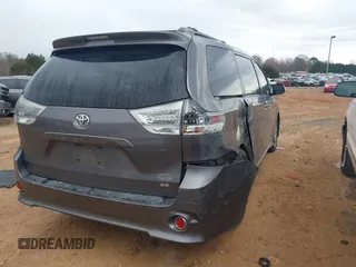 2011 Toyota Sienna SE with VIN 5TDXK3DC3BS143331, listed as a IAAI auction lot 41758043 with 215,490 mi miles. Bid and sale history available at carsss.com. Image 4.