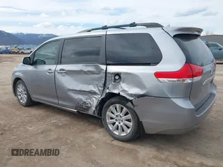 2014 Toyota Sienna Limited with VIN 5TDDK3DC7ES088938, listed as a IAAI auction lot 41885658 with 105,758 mi miles and . Bid and sale history available at DreamBid. Image 6.