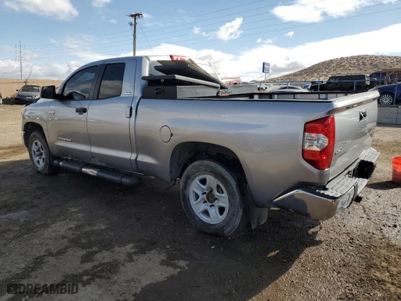 2018 Toyota Tundra 4WD SR with VIN 5TFUY5F17JX714885, listed as a Copart auction lot 48469155 with 183,665 mi miles and Salvage Title. Bid and sale history available at carsss.com. Image 2.