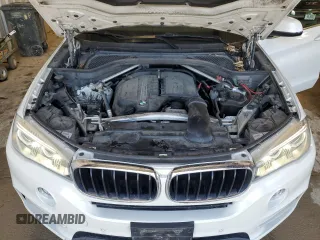 2014 BMW X5 sDrive35i with VIN 5UXKR2C55E0H31629, listed as a Copart auction lot 50957095 with 166,816 mi miles and Clean Title. Bid and sale history available at carsss.com. Image 12.