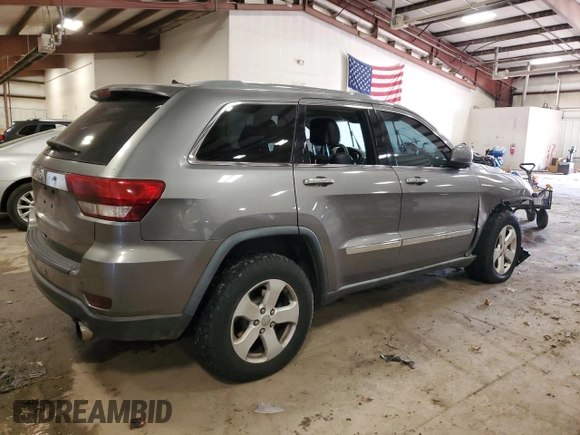 2012 Jeep Grand Cherokee Laredo with VIN 1C4RJFAT0CC226624, listed as a Copart auction lot 77114564 with 178,659 mi miles and Clean Title. Bid and sale history available at carsss.com. Image 3.