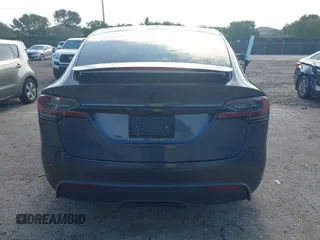 2022 Tesla Model X with VIN 7SAXCDE54NF342256, listed as a IAAI auction lot 41991212 with 28,740 mi miles and . Bid and sale history available at DreamBid. Image 16.